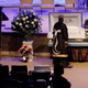 A mourner pays respects before the start of the funeral service for Atatiana Jefferson on October 24, 2019, at Concord Church in Dallas, Texas. On October 12, 2019 Jefferson was at home with her nephew when Fort Worth police officer Aaron Y. Dean, who was responding to a non-emergency call, fired one shot through a window, killing her. Dean has since resigned from the department and been charged with murder.